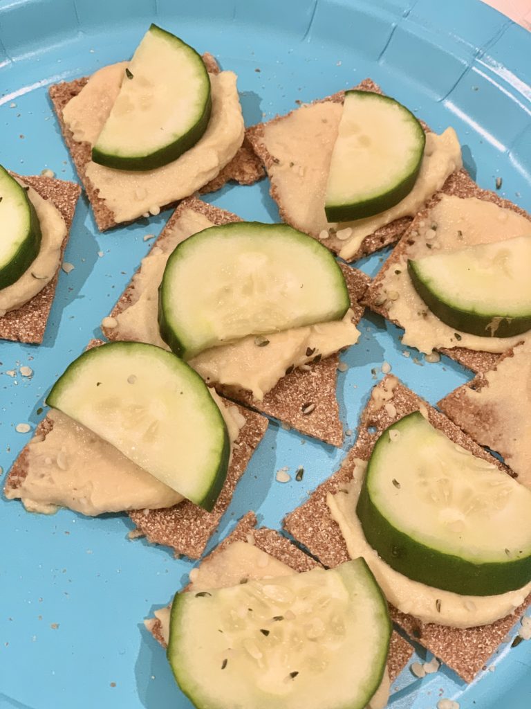 Cucumbers and Hummus on Crackers